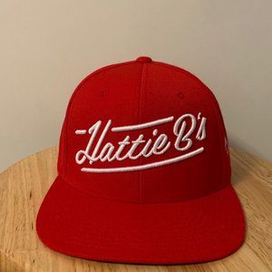 Red snap back hat